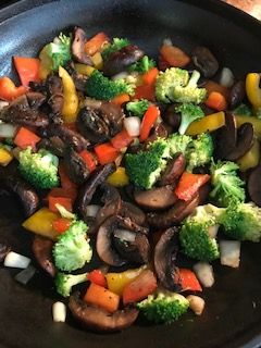 SautÃ©ed Broccoli, portobello mushrooms, peppers and onions